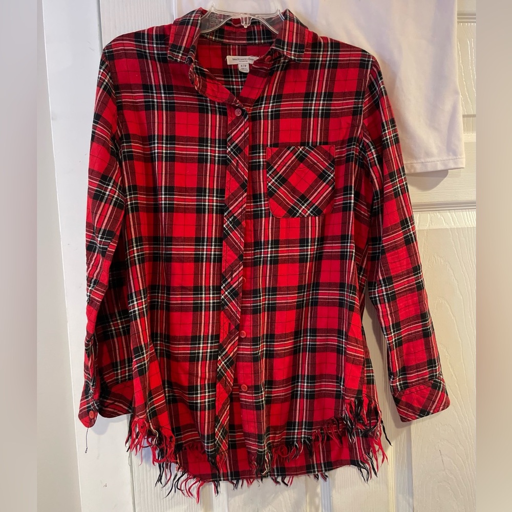 Cute flannel shirt with fringe at the bottom